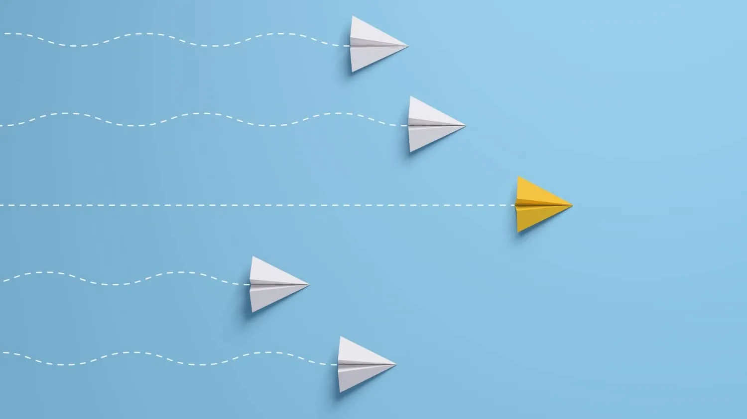 Racing Paper Airplanes and Yellow one in the lead